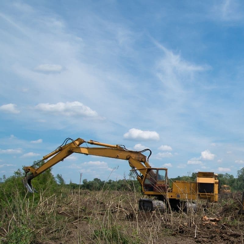Clearing land with heavy equipment