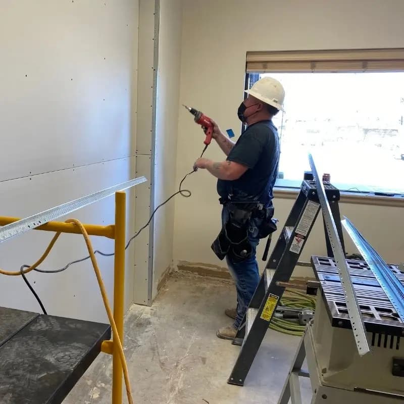Employee working on plant construction